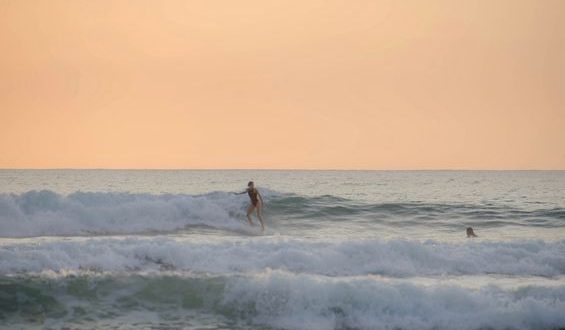 surf-and-yoga-retreats-girl-surfing