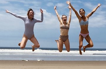 women-jumping-surf-trips-for-women